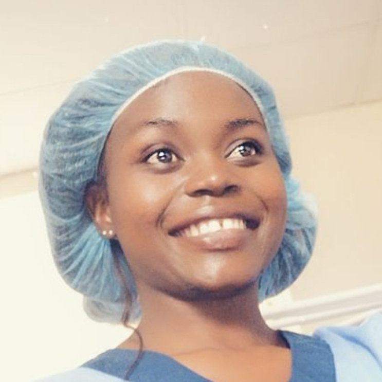 Photo of Harriet Tambudzai Jere in scrubs