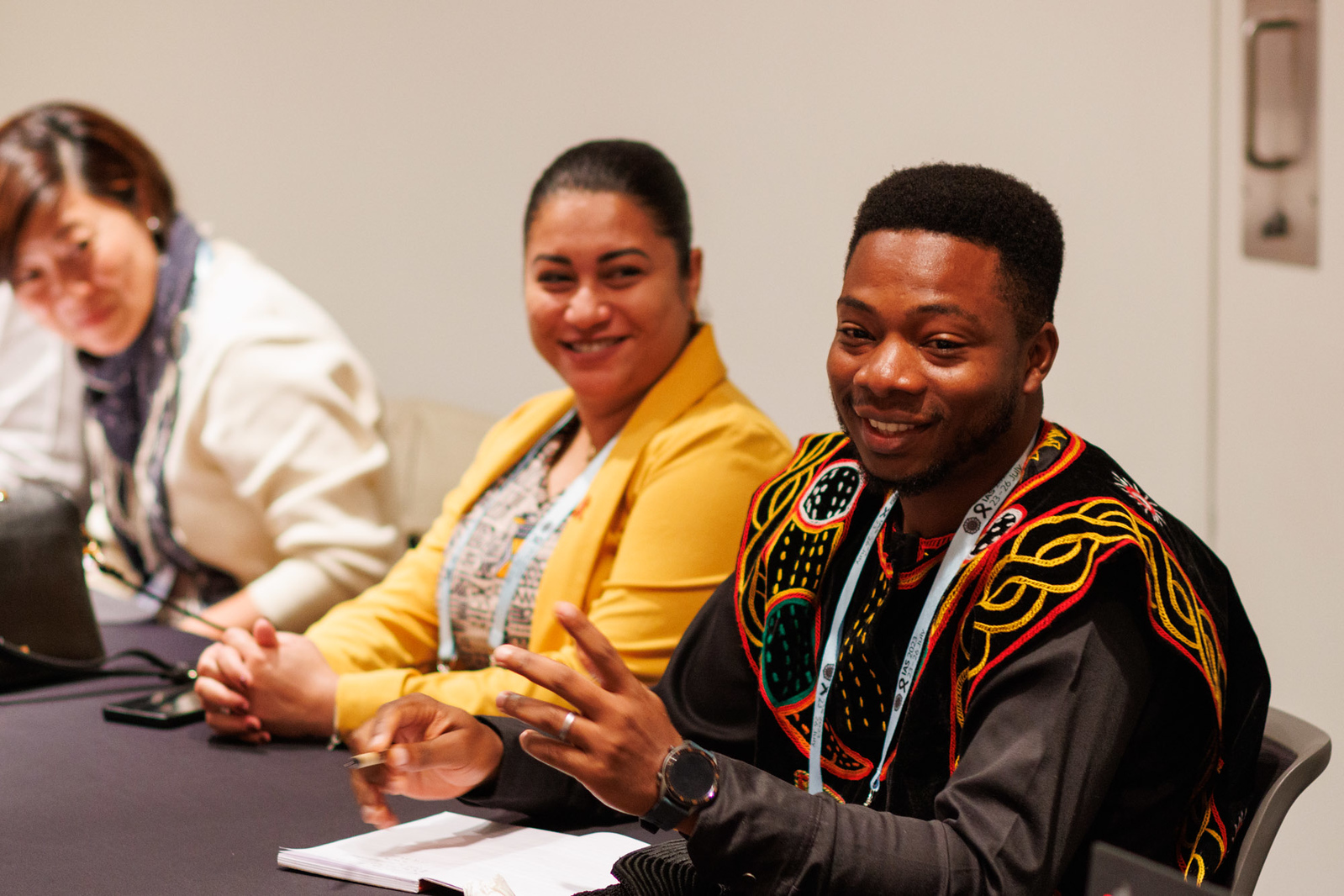 People smiling in a workshop setting